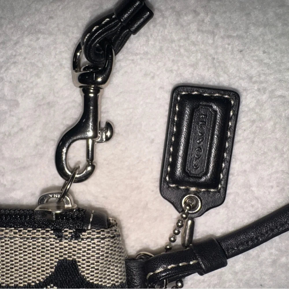 Coach Black and Tan Signature Canvas Wristlet